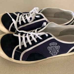 Neatly worn Gucci sneakers,